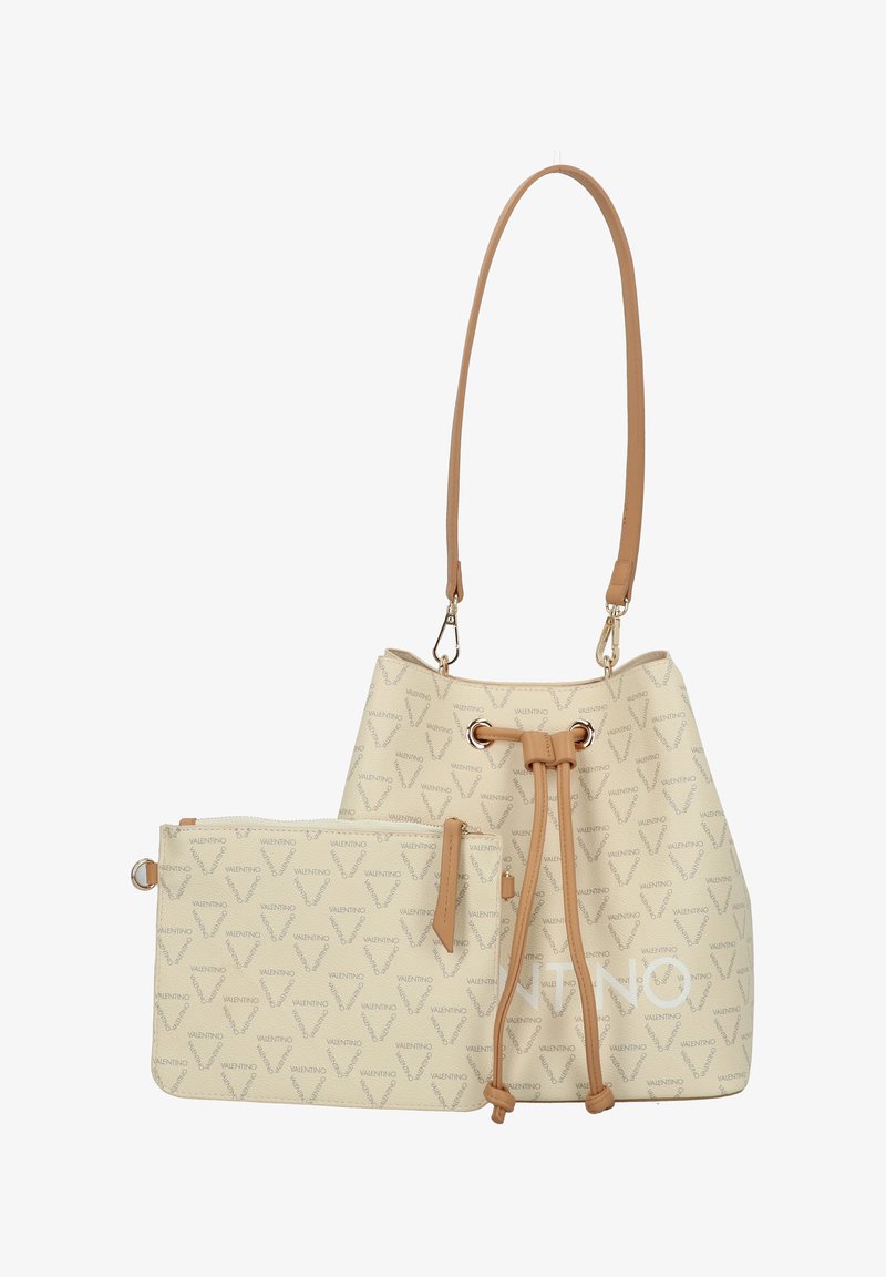 Beige bucket bag made of textured material with a drawstring closure, tan accents, and a detachable zippered pouch featuring a logo pattern.