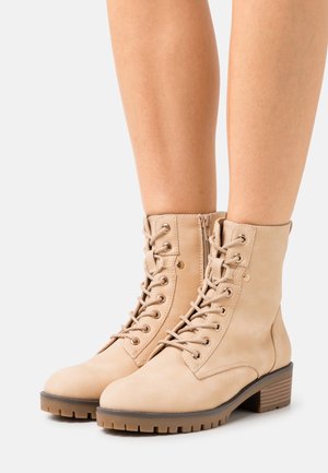 Bottines à lacets - beige