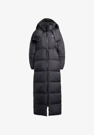 Black puffer coat with a long silhouette, a drawstring waist, and a hood. Features quilted sections and a zip front closure.