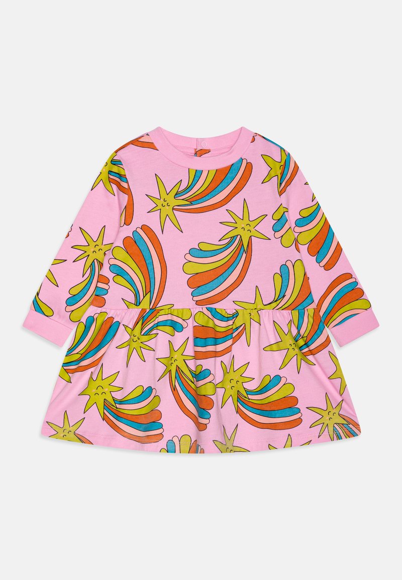 Long-sleeve dress in pink cotton featuring colorful starburst patterns, with a fitted bodice and flared skirt. Includes a back snap closure.