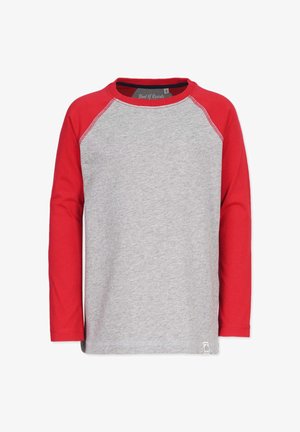 Pitkähihaisessa t-paidassa on harmaa vartalo ja punaiset raglan-hihat. Se on valmistettu puuvillasta ja siinä on pyöreä pääntie sekä pieni logo-etiketti helman kohdalla.