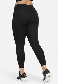 Nike Performance UNIVERSA - Tights - black black