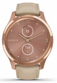 Orologio Garmin con cassa rotonda in oro rosa, cinturino in pelle beige chiaro e quadrante in bronzo testurizzato che mostra la data e le icone delle attività.