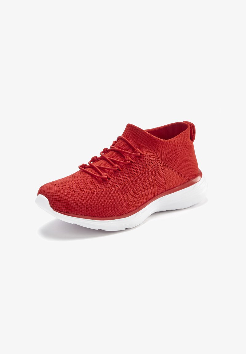 Red knitted athletic shoe with a white sole, featuring elastic laces and a high cut around the ankle for secure fit. Textured upper design.