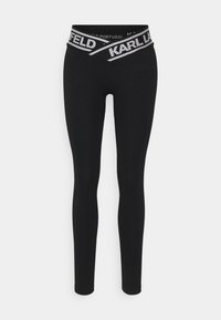 Zwarte leggings van rekbaar materiaal, met een brede elastische tailleband voorzien van het "KARL LAGERFELD" logo in zilver. Glad textuur overal.