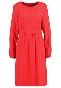 Rotes Kleid aus weichem Stoff, mit langen Ärmeln, rundem Ausschnitt und gefalteten Details an der Taille für eine lockere Passform. Reißverschluss hinten.