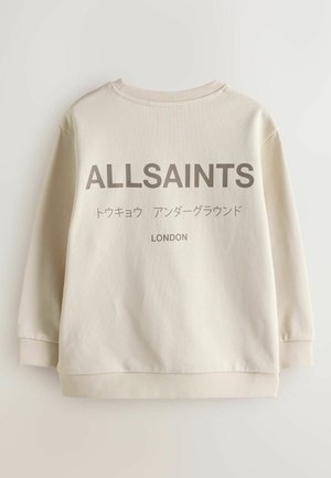 Sweatshirt beige avec le texte « ALLSAINTS » et « LONDON » en gris foncé audacieux, avec des caractères japonais en dessous. Poignets et ourlet côtelés.