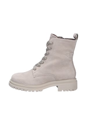 Light grey ankle boots made of suede leather, featuring a lace-up design, chunky white sole, and a pull-tab at the back.