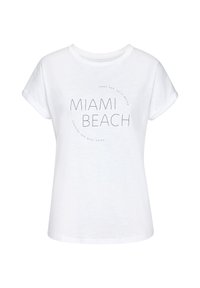 White cotton t-shirt with rolled short sleeves, featuring "MIAMI BEACH" text in black, with a circular graphic and additional text.