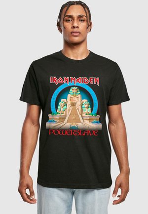 Black cotton t-shirt featuring an Egyptian-themed graphic, depicting a large statue, pyramids, and the text "Iron Maiden Powerslave" in red.