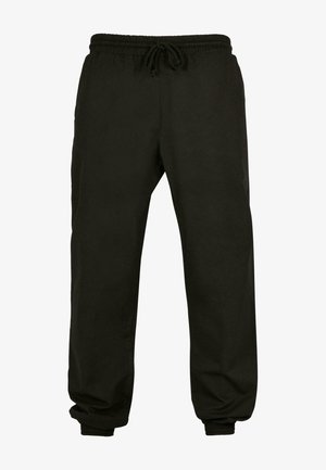 Fekete melegítőnadrág rugalmas derékpánttal és állítható zsinórral, rugalmas bokákkal és laza szabással.