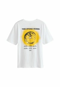 Valkoinen puuvilla-T-paita, jossa on pyöreä keltainen graafinen elementti ja musta teksti, jossa on "The Stone Roses" -yhtyeen konserttipäivämääriä takana.