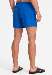 Ombre Uimashortsit - blue