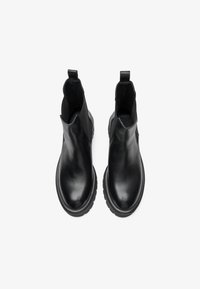 Black leather ankle boots with elastic side panels and pull tabs, featuring a rubber sole and smooth, shiny texture.