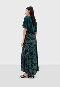 Thinking Mu TORA - Gonna lunga - pine green