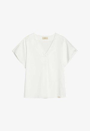 Biała bluzka z krótkim rękawem, dekoltem w serek i subtelnym szwem z przodu, ułożona na płasko na białym tle.