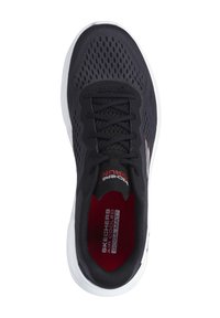 Black athletic shoe with breathable mesh upper, flat laces, and a cushioned red insole. Features a white outsole and Skechers branding.