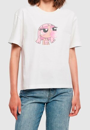 Person wearing white T-shirt with cartoon of pink-haired girl blowing a pink bubblegum bubble, paired with blue jeans.