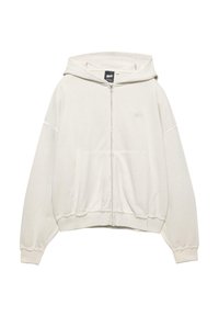 Zipper-Hoodie in hellem Beige. Baumwollmischung, Kordelzugkapuze, Kängurutaschen, gerippte Bündchen, raw hem Details und dezentes Logo auf der Brust.