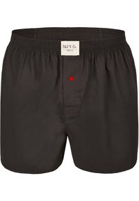 Černé bavlněné boxerky s elastickým pasem, které mají vpředu červené zapínání na knoflík a malou etiketu s nápisem "Phil & Co. BERLÍN."