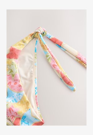 Monivärinen bikiniyläosa, jossa solmuvivahde. Siinä on kukka- ja geometrisia kuvioita vaaleanpunaisen, sinisen, keltaisen ja vihreän sävyissä. Säädettävät nyörit.