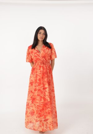 Robe maxi en tissu orange transparent avec imprimé floral, décolleté en V, manches courtes bouffantes, et taille élastique pour un ajustement sophistiqué.