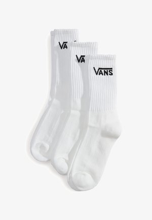 Vita bomull crew-strumpor med ribbad textur och svart "VANS"-logga högst upp. Inkluderar tre par i setet.