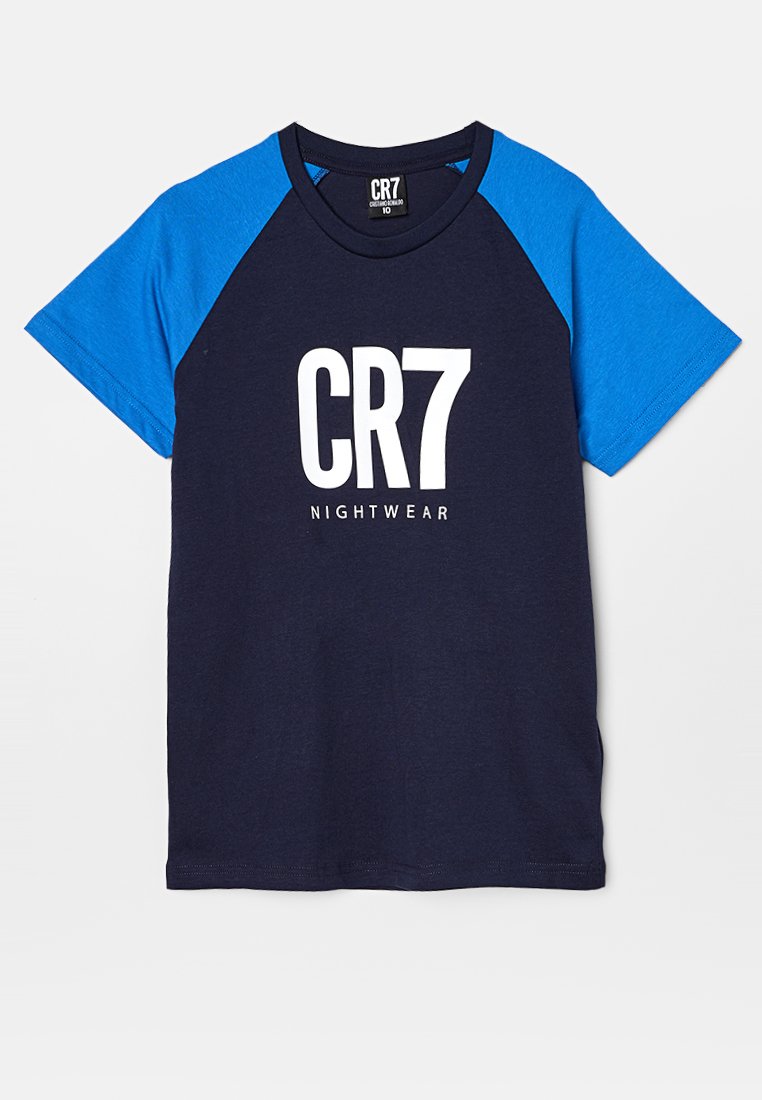 T-shirt à manches courtes bleu marine avec des manches raglan bleues, présente un grand texte blanc "CR7 NIGHTWEAR" sur le devant, fabriqué en tissu doux.