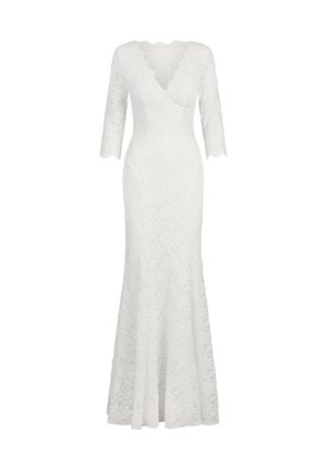 Biała koronkowa sukienka z długimi rękawami, dekoltem w kształcie litery V, dopasowaną sylwetką i rozkloszowanym dołem. Charakteryzuje się kwiatowym wzorem na całej tkaninie.