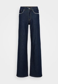 Mørkeblå vidde jeans laget av denim, med høy midje, metallknapplukking og dekorativ søm langs lommene.