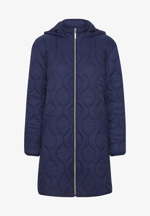 Tumši zilas krāsas džemperis ar kapuci, ar priekšējo rāvējslēdzēja aizdari un teksturētu rakstu ar noapaļotām formām. Mīksts, gluds audums.