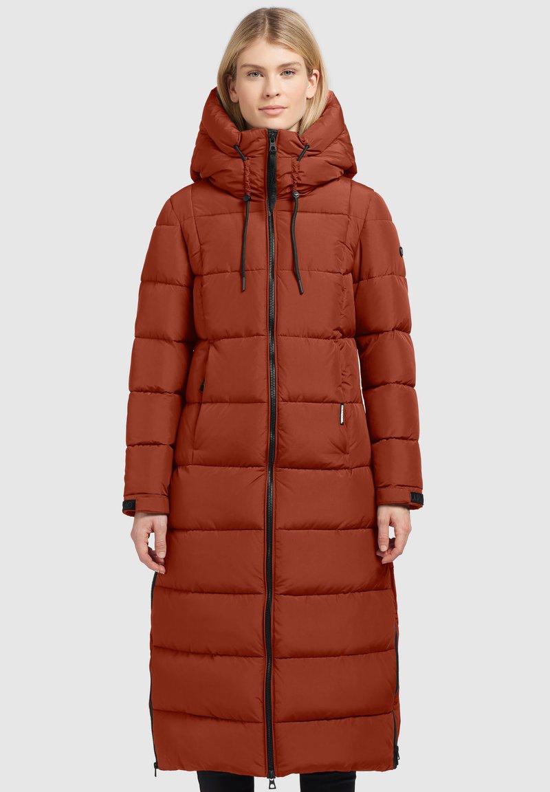 Lange pufferjas in gebrande sinaasappel, met een hoge kraag met trekkoorden, een doorgestikte design, een volledige rits en zijzakken.