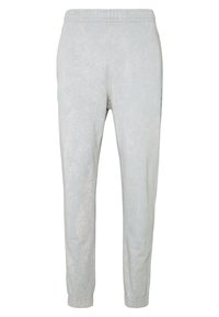 Ljust blå sweatpants med en bleknad struktur, elastisk midja och avslutade ben. Enkel design med ett subtilt marmormönster.
