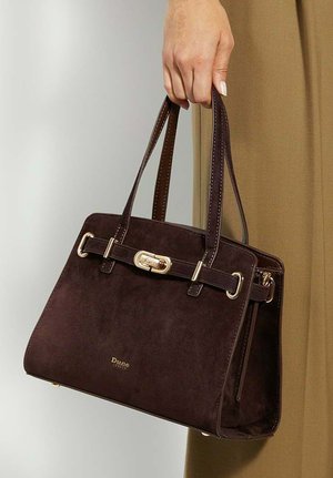 Dark brown suede handbag with a structured design, gold-tone hardware, a strap detail, and double top handles. Features embossed logo.