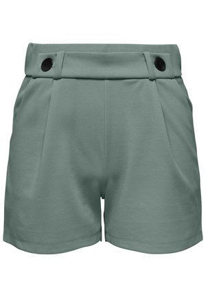 Green pleated shorts with a high waist, featuring two black buttons and a smooth, textured fabric.