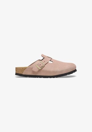 Light pink suede clog with a cork footbed, adjustable strap, and black rubber outsole. Features a rounded toe and smooth texture.
