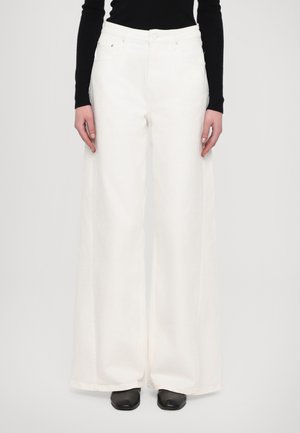 White wide-leg jeans made of denim, featuring a high waist, front pockets, and a classic five-pocket design. Smooth texture and tailored cut.