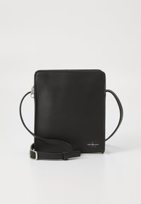 Calvin Klein Jeans - MONO LOGO PHONE - Torbica za telefon - black Miniaturna slika 1