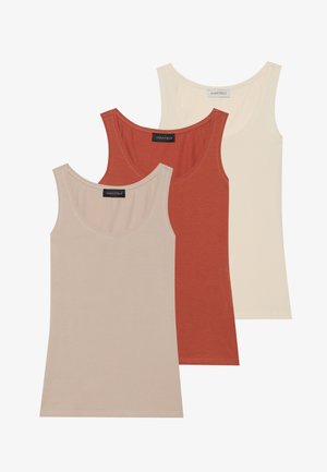 Three sleeveless tank tops in beige, rust, and cream colors. Made of soft fabric with a round neck and regular cut. Labels visible inside.