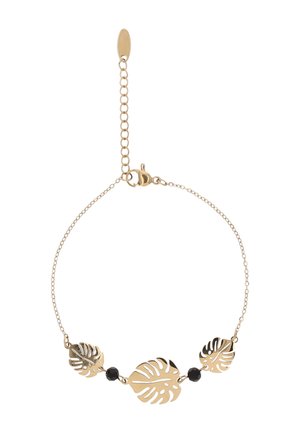 Delikatna złota bransoletka z łańcuszkiem, ozdobiona trzema złotymi zawieszkami w kształcie liści monstery, rozdzielonymi dwoma małymi czarnymi koralikami oraz zapięciem na karabińczyk.
