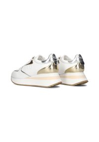 White and gold athletic shoes with metallic accents, featuring a sleek design, cushioned sole, and textured rubber outsole for grip.