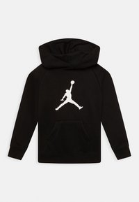 Schwarzer Kapuzenpullover mit Fronttasche, auf der Rückseite mit einem großen weißen Jumpman-Logo. Hergestellt aus weichem Stoff, mit gerippten Bündchen.