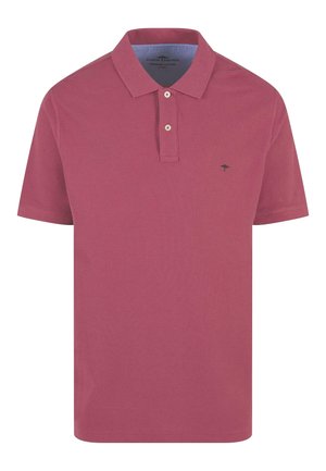 Koszulka polo z krótkim rękawem w bursztynowym kolorze z bawełny, z dwoma guzikami przy plastrze oraz granatowym wykończeniem kołnierzyka. Posiada mały emblemat na piersi.