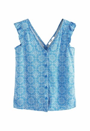 Mouwloze blauwe blouse met knopen, met wit ingewikkeld geometrisch bloemmotief en gerimpelde schouderdetails.