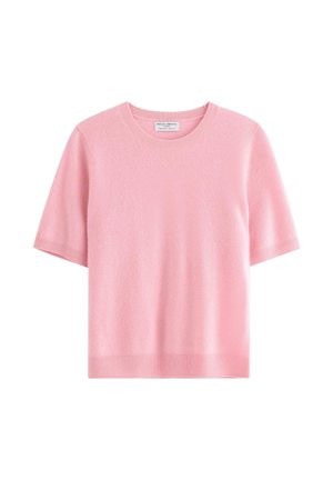 Ljust rosa kortärmad tröja i mjukt material, med rund hals och stickad ribbad kant vid nederkant och ärmar.