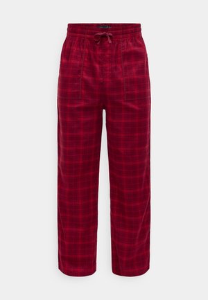 Czerwone spodnie w kratę z elastycznym paskiem, sznurkiem i dwiema bocznymi kieszeniami; wykonane z miękkiego materiału, o regularnym kroju.