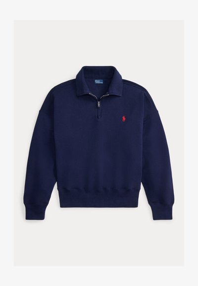 Temno modra pulover majica s puloverjem z zadrgo do polovice, rebrastimi manšetami in spodnjim delom, z majhnim rdečim logotipom na levi strani prsnega koša.