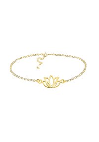 Bracciale dorato con design a fiore di loto. Maglie a catena, con chiusura regolabile e un piccolo dettaglio pendente decorativo.