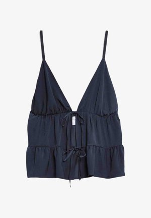 Marineblauwe peplumtop met diepe V-hals, verstelbare dunne banden en sluiting met strik aan de voorkant. Gemaakt van lichte, vloeiende stof.