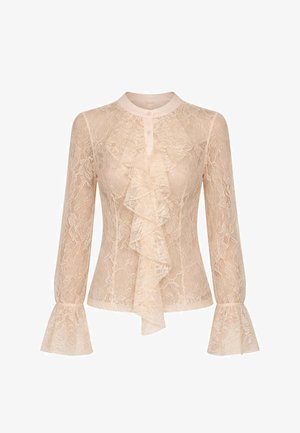 Blusa beige in pizzo a maniche lunghe con volant sul davanti, polsini svasati e scollo rotondo con bottoni.